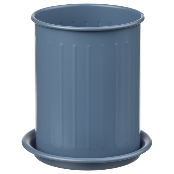 Blue cylindrical VÄLVÅRDAD container with vertical ribs on a matching saucer. Made of powder-coated galvanized steel and stainless steel.