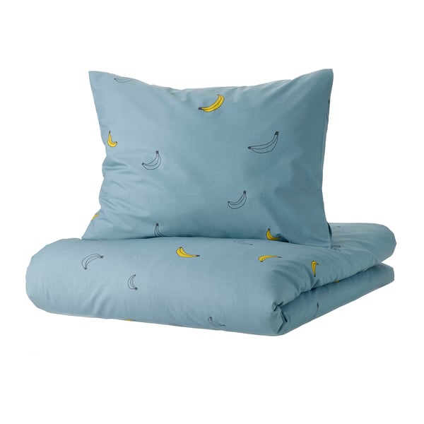 Blue bedding set with banana prints, featuring a duvet cover and pillowcase. Made from cotton and viscose for comfort.