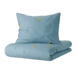 Blue bedding set with banana prints, featuring a duvet cover and pillowcase. Made from cotton and viscose for comfort.
