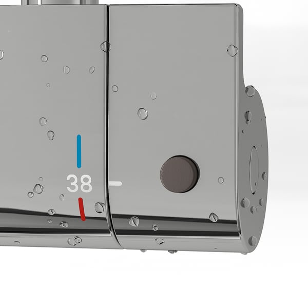 Close-up of thermostatic shower mixer with 38°c safety stop button.