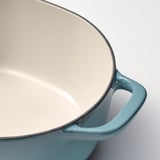 Teal cast-iron handle.