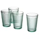 Four clear green-tinted, fluted glass cups with large bases and narrow rims, arranged in a line. Made of tempered glass.