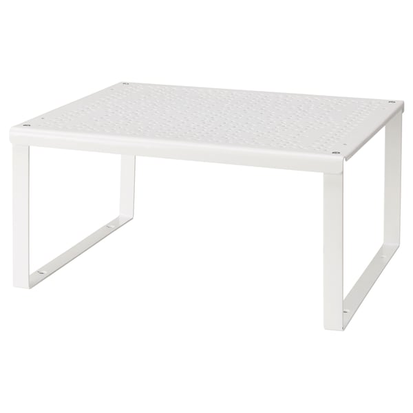 A white VARIERA shelf insert. Its square-shaped with a perforated top, supported by four metal legs.