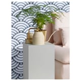 VATTENKRASSE watering can with plant on white stand