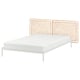 Rattan headboard bed with metal frame, white with woven design.
