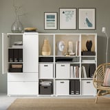 White modular storage unit with mix of open and closed shelves. Displays decor and stores books, boxes, and files.
