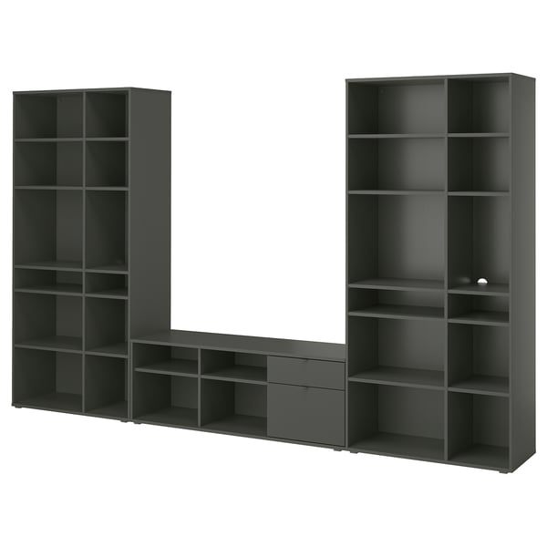 Displays a sleek black VIHALS storage set, featuring shelves and a bench. Its designed for organizing and concealing clutter, ideal for living spaces.