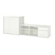 White VIHALS storage set, modern minimalist design. Includes cabinet with sliding doors and open tv unit.