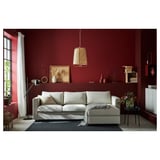 Modern living room with red walls, light grey VIMLE sofa, boho lamp, white curtains, and decorative items.