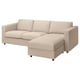 A light beige VIMLE sectional sofa with a chaise lounge section on the right, supported by dark wooden legs.