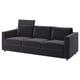 A modern VIMLE sofa in dark gray. It a sleek design, three cushions, and a headrest for comfort.