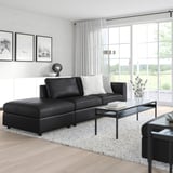 Modern living room with VIMLE sofa, large windows, and nature prints.