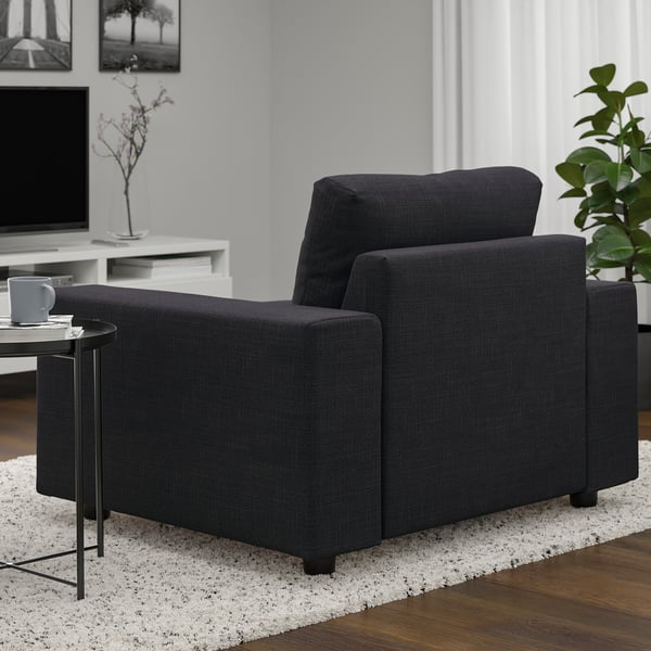 Dark grey VIMLE armchair with wide, supportive armrests and removable, machine-washable upholstery.