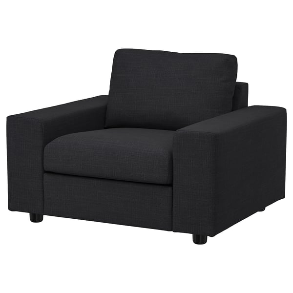 Black VIMLE armchair, modern and sleek design, cozy for seating.