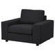 Black VIMLE armchair, modern and sleek design, cozy for seating.