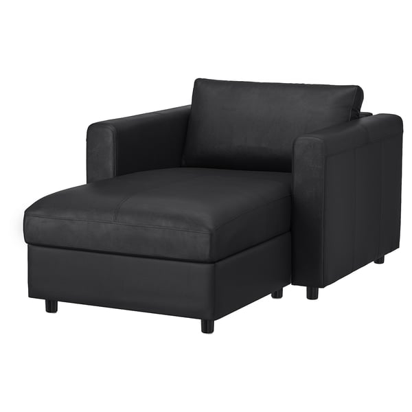 Modern black l-shaped sectional sofa with storage and sleek design.