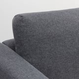 Close-up of dark VIMLE sofas arm and back. Soft, durable fabric with clean lines.