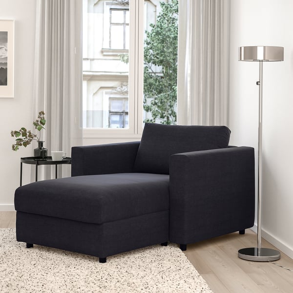 Modern VIMLE grey l-shaped sofa, cozy & functional with storage. Fits neatly by large window.