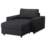 A VIMLE black fabric sofa with built-in storage, sleek design, and modern style.