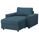 Blue fabric sofa chair with angled seat and back, four dark legs, modern design.