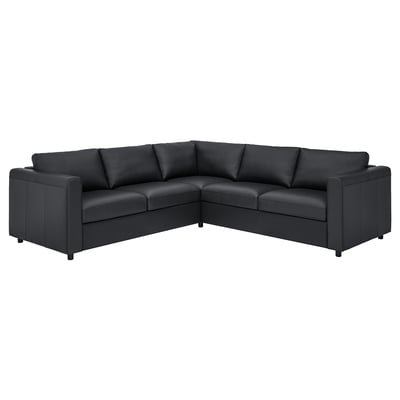 Displays a black l-shaped VIMLE sectional sofa with smooth grain leather and coated fabric, featuring clean lines and multiple cushions.