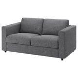 A VIMLE sofa in grey, featuring a durable, textured fabric cover. Its a two-seater with a modern minimalist design, raised legs, and clean lines.