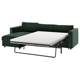 Image shows green VIMLE sofa-bed, modern design, dark velvet fabric, fully converted to bed position.