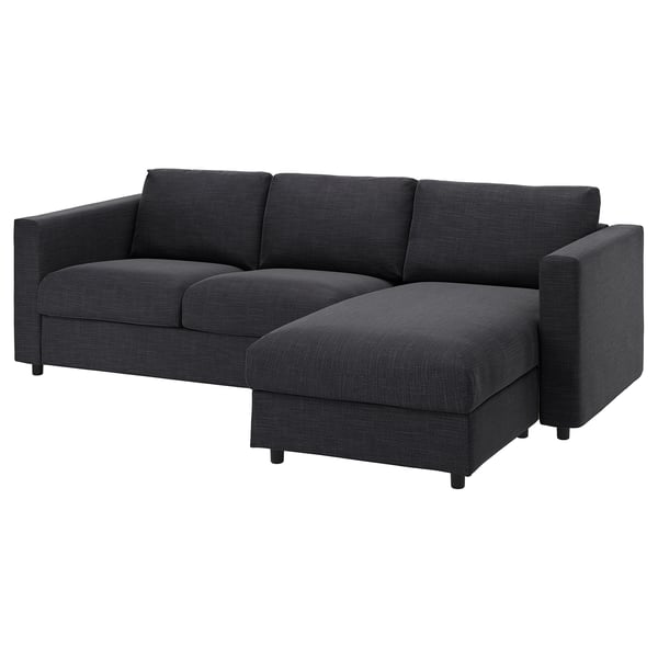 A VIMLE dark grey sectional sofa. It is modern, rectangular, with a comfortable and sleek design. The sofa a chaise longue, suitable for relaxing.