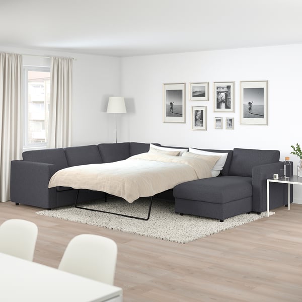 VIMLE sectional sofa in grey, spacious & modern with convertible bed, fits perfectly under gallery photos, efficient & cozy.