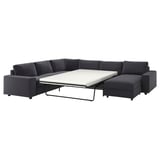 A dark grey VIMLE sectional sofa with a fold-out bed, featuring a modern design and versatile layout.