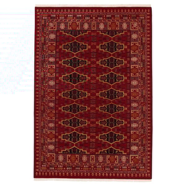 Vimpelegraes: red, rectangular, hand-knotted wool rug with intricate geometric patterns.
