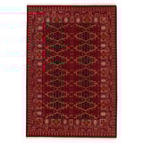 Vimpelegraes: red, rectangular, hand-knotted wool rug with intricate geometric patterns.