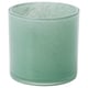 Green glass cylindrical tealight holder with textured design.