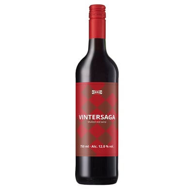 A red bottle with IKEAs VINTERSAGA label, a mulled red wine, 750 ml, 12. 0% vol. , standing upright.