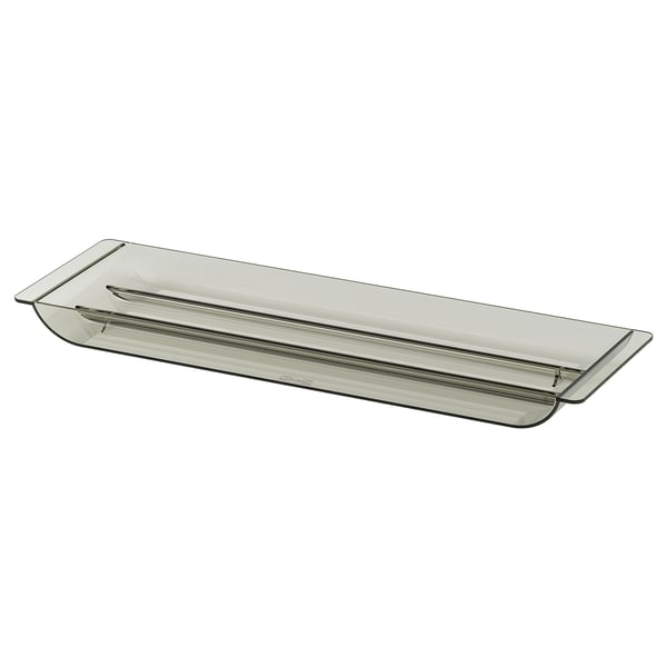 A VISSLAÅN drawer organizer in dark transparent plastic, rectangular shape, designed for extra shelf storage.