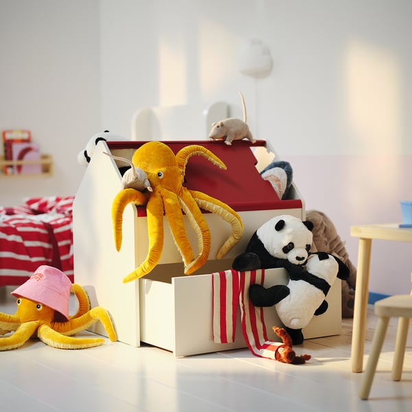 Kids storage box in beige, white, and red. Holds plush toys, ideal for organizing.