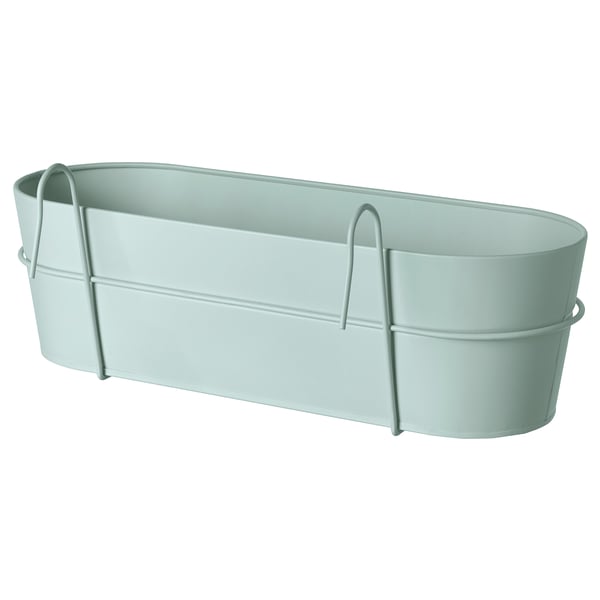 An ikea VITLÖK green metal planter. This rectangular, light gray planter, made of galvanized steel, comes with integrated hooks for easy hanging.