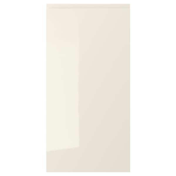 VOXTORP: beige high-gloss kitchen cabinet door with sleek, clean lines and integrated handles.