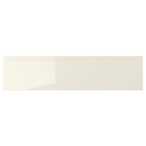 VOXTORP: beige glossy drawer front with seamless handle.