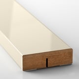 A close-up of a sleek, modern drawer front with a beige glossy surface and integrated handle.
