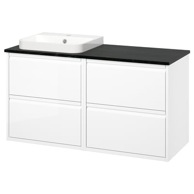Modern white bathroom vanity with black countertop, square sink, and two cabinets.