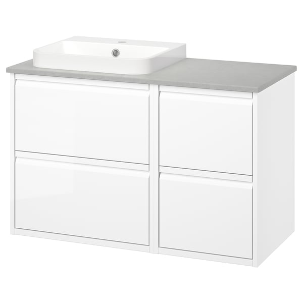 Modern white bathroom vanity with four drawers, marble counter, and rectangular sink.