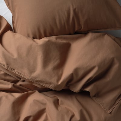 ÄNGSLILJA bedset in beige, 3-piece cotton, folded, soft, earthy.