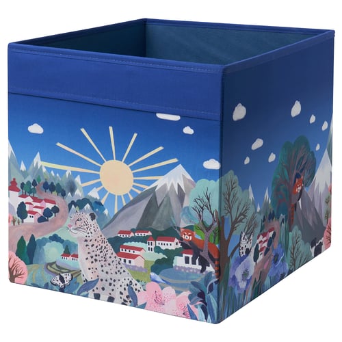 A blue ALPTALL fabric storage box with a nature-themed design, including animals and mountains, suitable for kallax shelving.