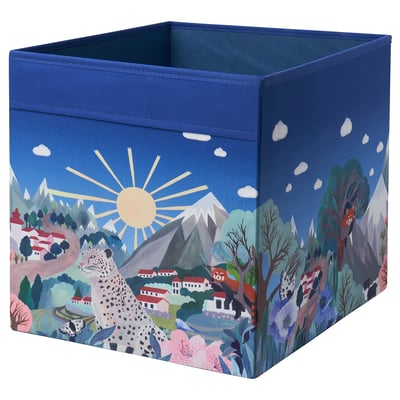 A blue ALPTALL fabric storage box with a nature-themed design, including animals and mountains, suitable for kallax shelving.