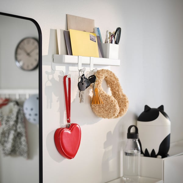 Organised wall rack with hooks, a shelf, and a container for keys, notes, and small items. Ideal for hallways or desks.