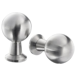 Stainless steel BAGGANÄS knobs, round and sleek, modern design, shown separately and together.