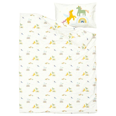 This image shows a white BARNDRÖM pillowcase with playful yellow and green horse illustrations and a rainbow. The material is 100% cotton.