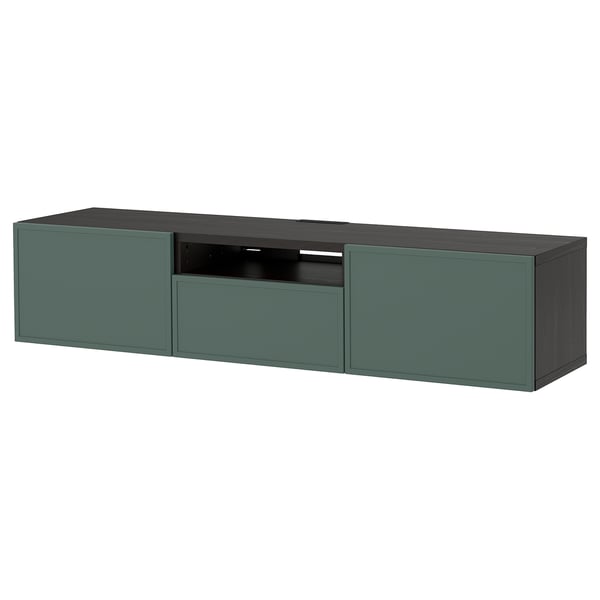 An IKEA BESTÅ tv bench in green. It multiple storage sections and cable management solutions.