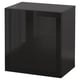 A black BESTÅ cabinet with a sleek, glossy finish and glass door. It has a square shape and modern design.
